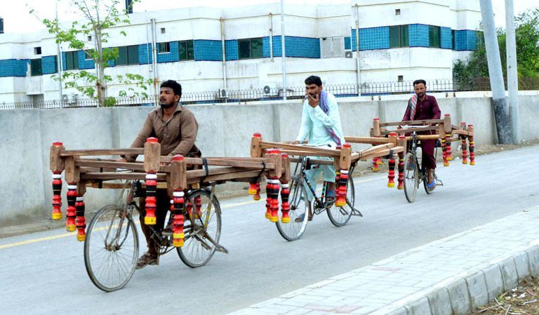 Beds on bicycle in Multan